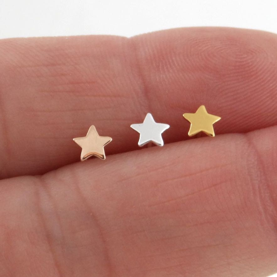 SINGLE-Tiny Star Earring in Sterling Silver