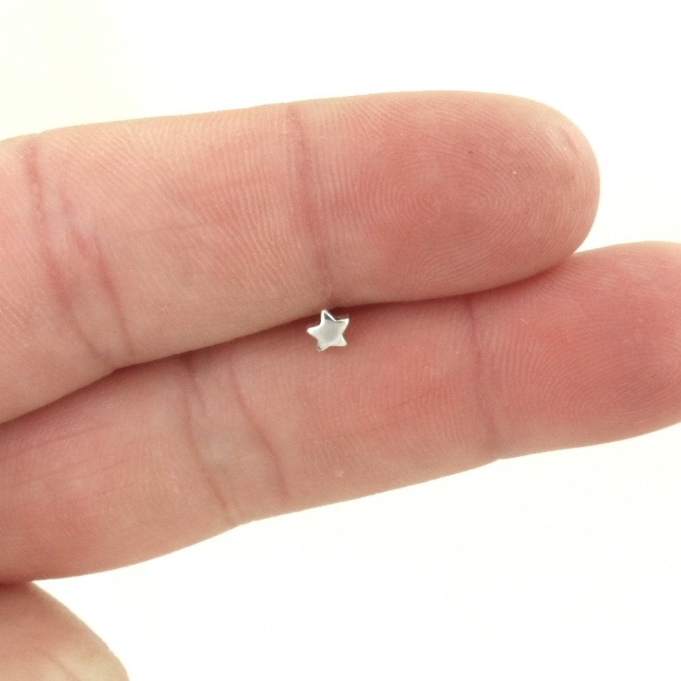 SINGLE Tiny Star Earring in Sterling Silver